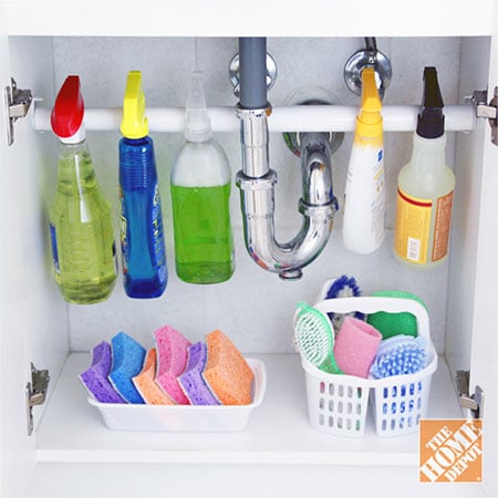 insert a tension rod under the sink