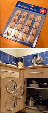 stick adhesive clips to your cupboard